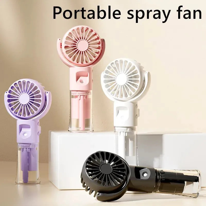 Handheld portable mist fan showing transparent water tank and multiple colour options