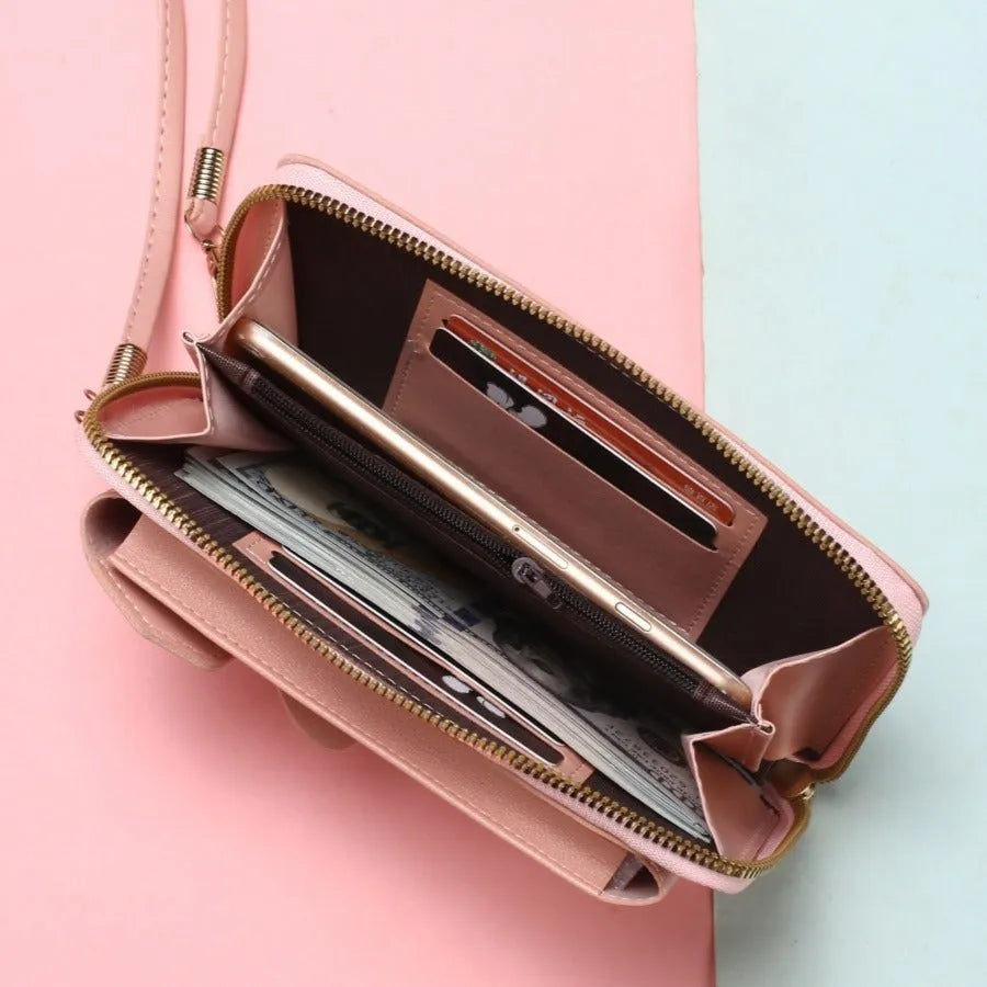 Mini crossbody phone bag for women in black PU leather with sewing thread detail