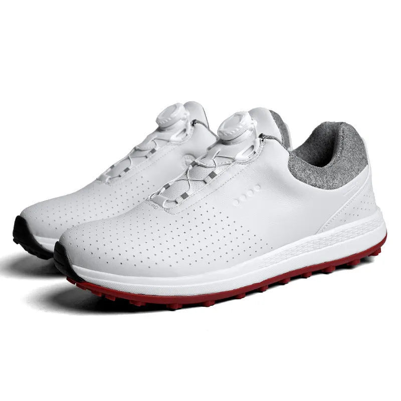 Men's white low top golf sneakers with breathable holes and a textured non-slip sole.