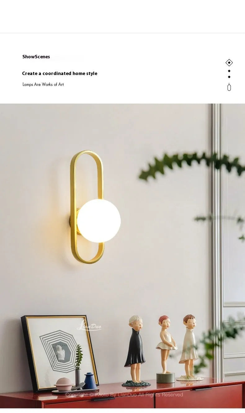 Modern minimalist wall lamp with glass shade and iron mount in black or gold finish