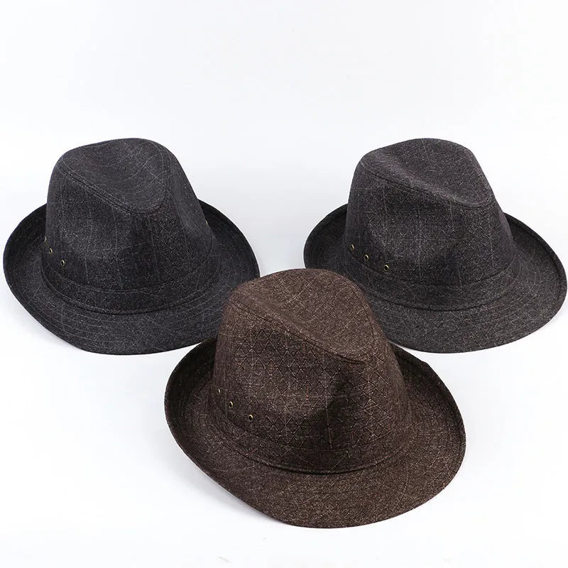 Classic brown fedora hat for men on a wooden stand, showing pinched crown and medium brim.