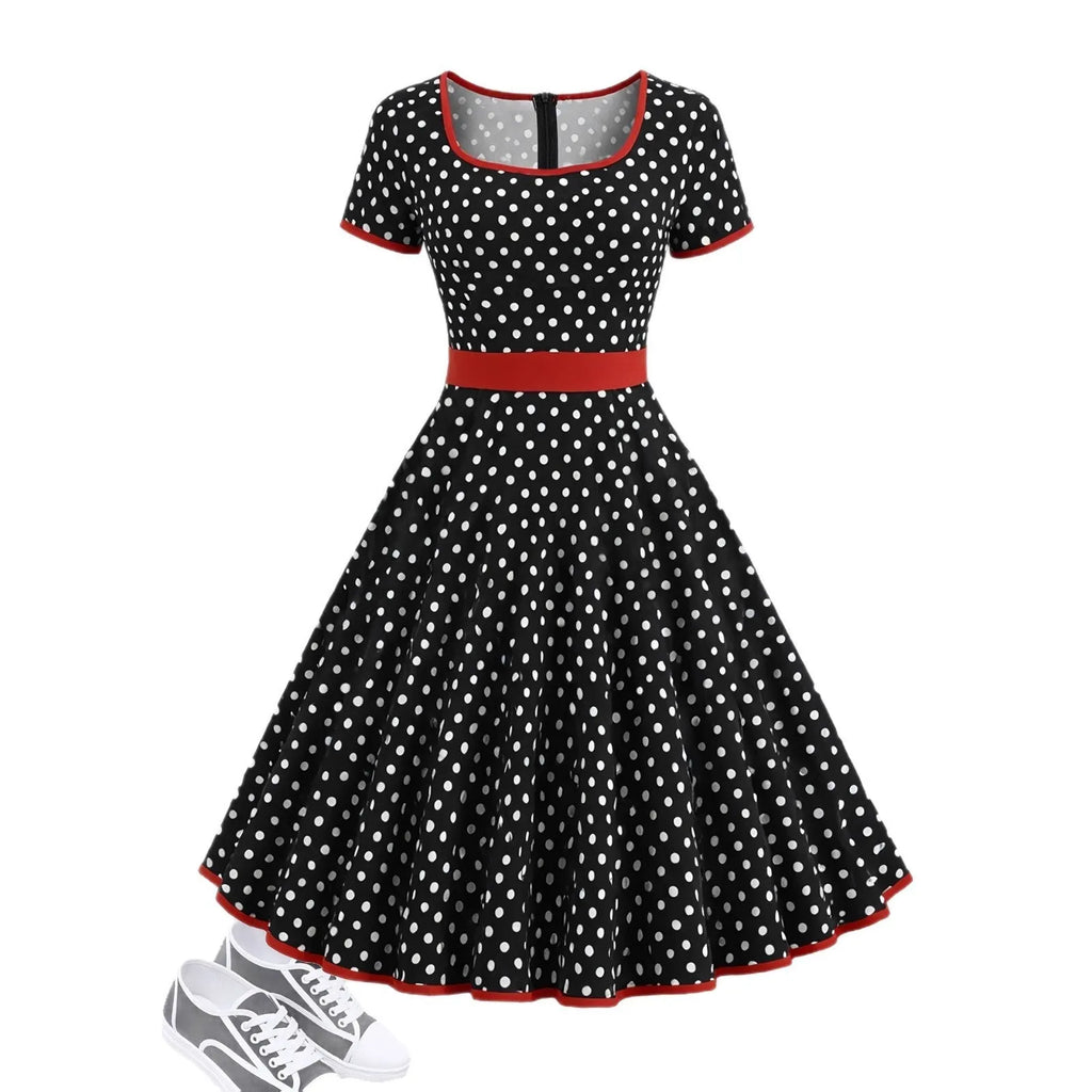 Women's multicolour polka dot dress with a square collar, short sleeves, and a pleated mid-length skirt.