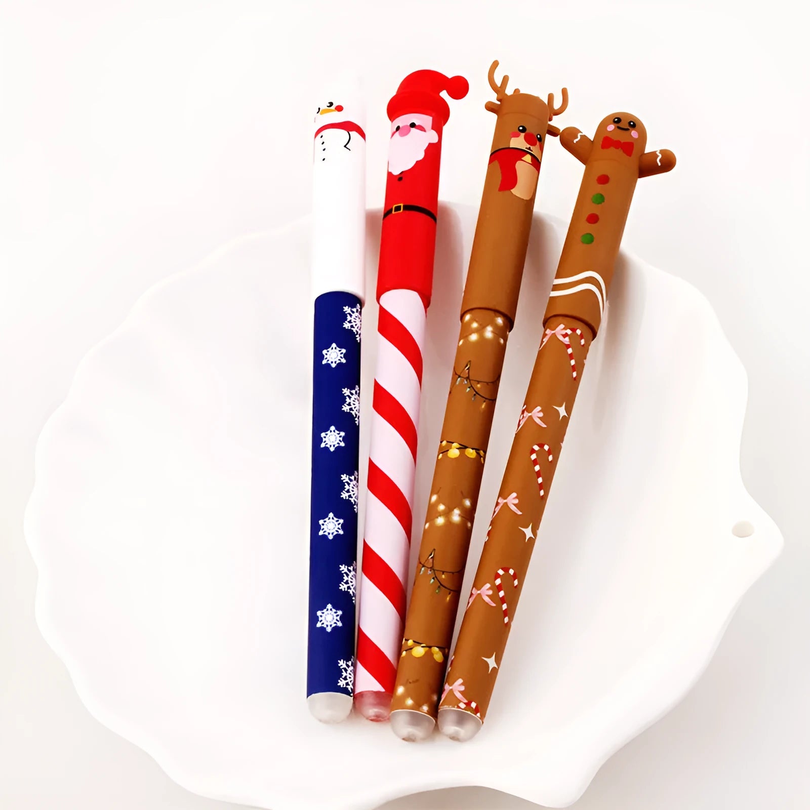 Set of 4 Christmas-themed erasable gel pens with 0.5mm fine tip in red, black, green, and blue