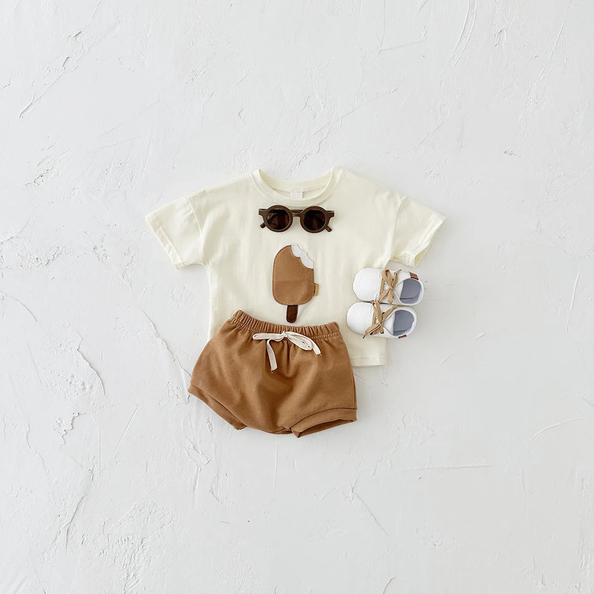 Girls' apricot cotton shorts suit two-piece set with ice cream patch on shirt.