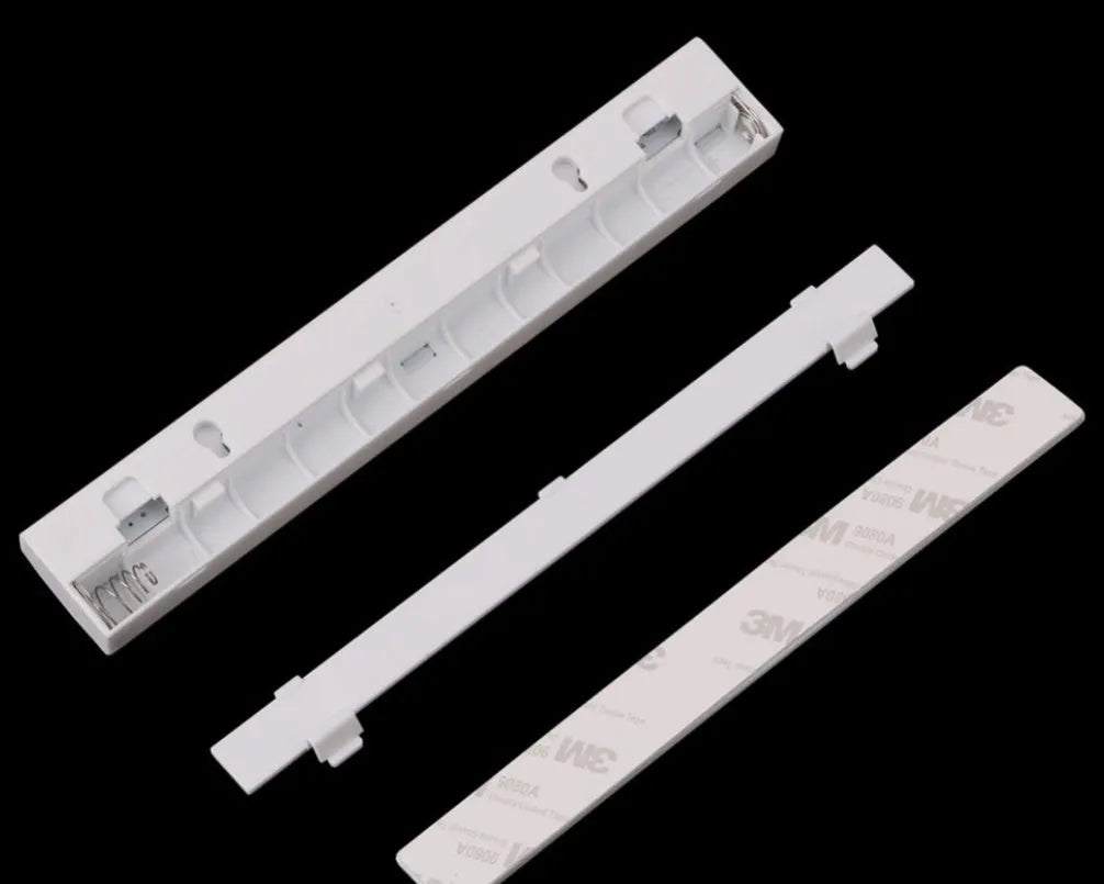 USB rechargeable magnetic LED closet light with motion sensor on a metal surface.