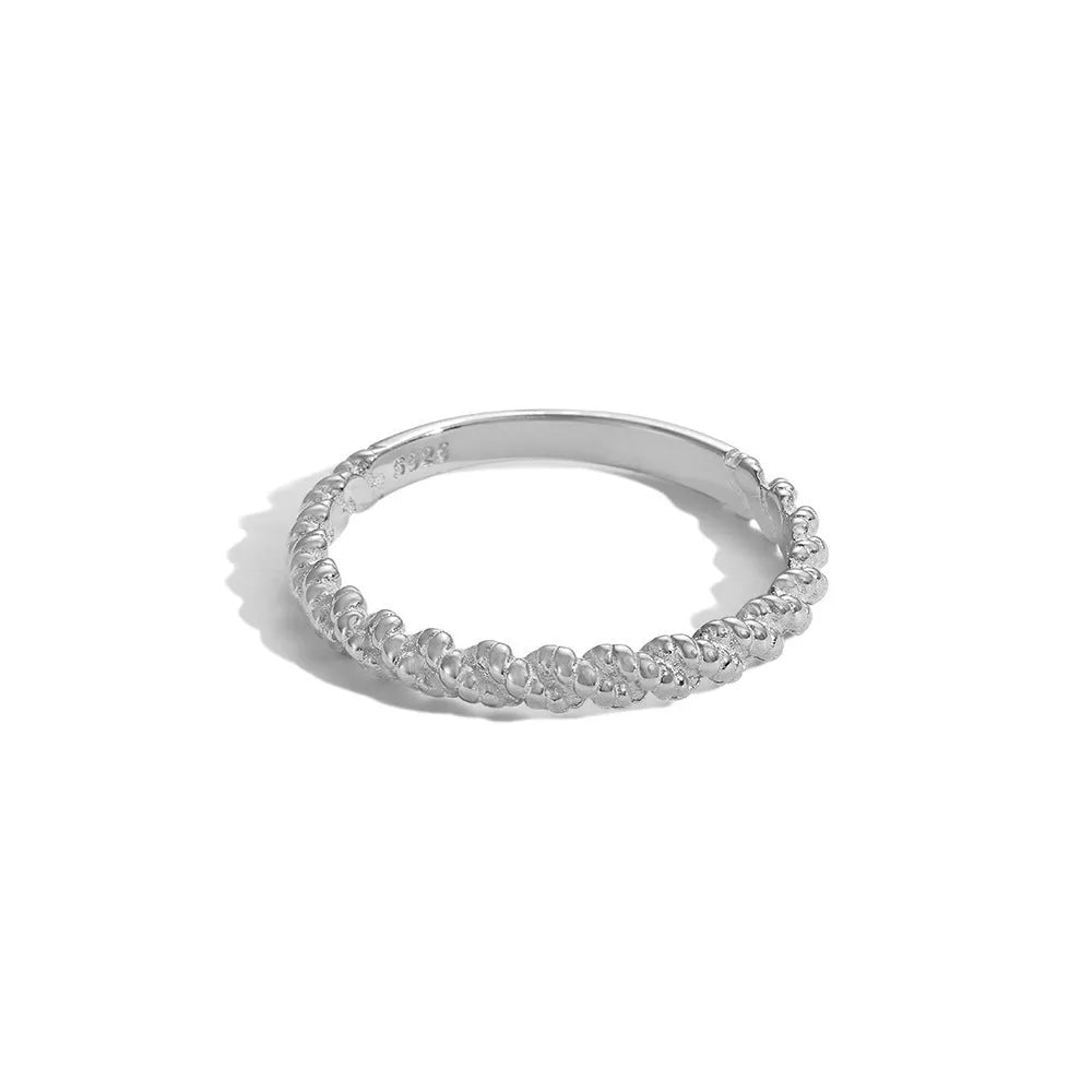 S925 sterling silver ring with geometric twist design in white gold colour finish