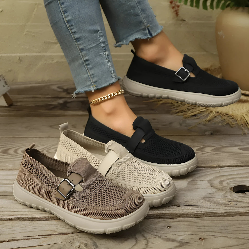 Slip-on sneaker with Flyknit upper, mid-top wedge heel, available in beige, black, brown