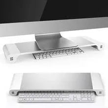 Smart aluminium and plastic computer monitor stand with USB charging ports and a hidden keyboard storage shelf