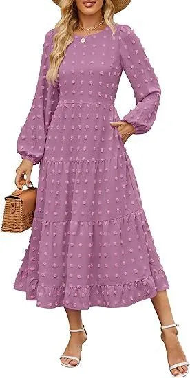 A beige high-waisted long sleeve dress with ruffled sleeves on a hanger.