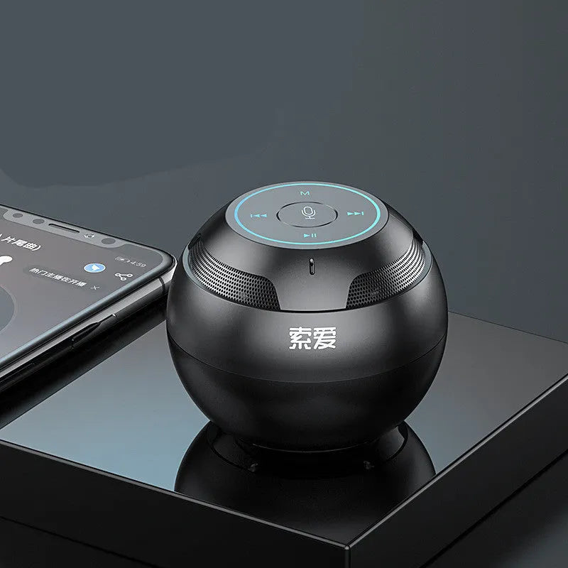Mini portable Bluetooth speaker in black with compact 76x76x63mm plastic shell and USB port
