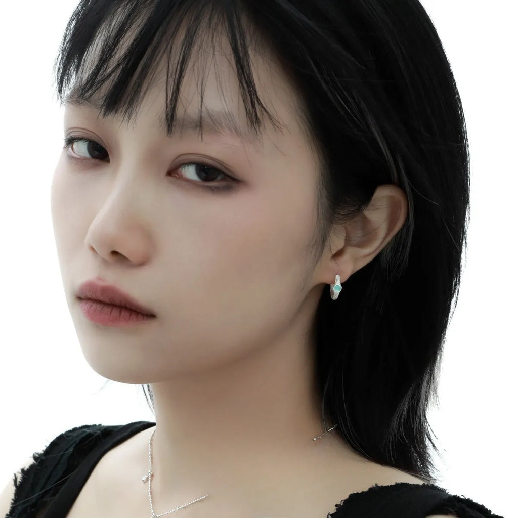 925 silver geometric round ear clip in burnt silver colour with clip-on mechanism, original design for women