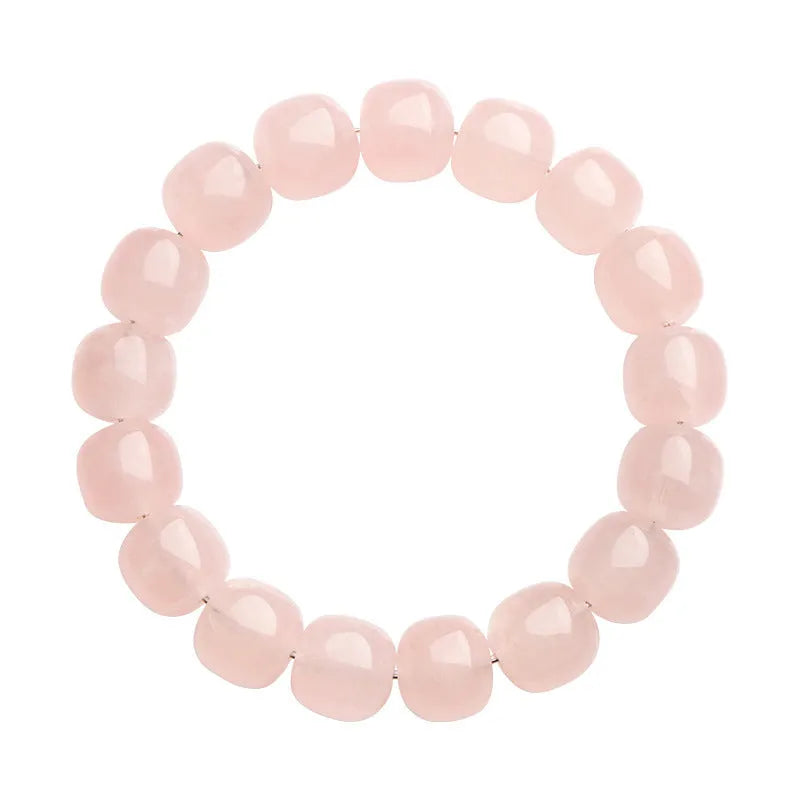Pink unisex crystal bracelet with geometric barrel beads measuring 11-12 mm.
