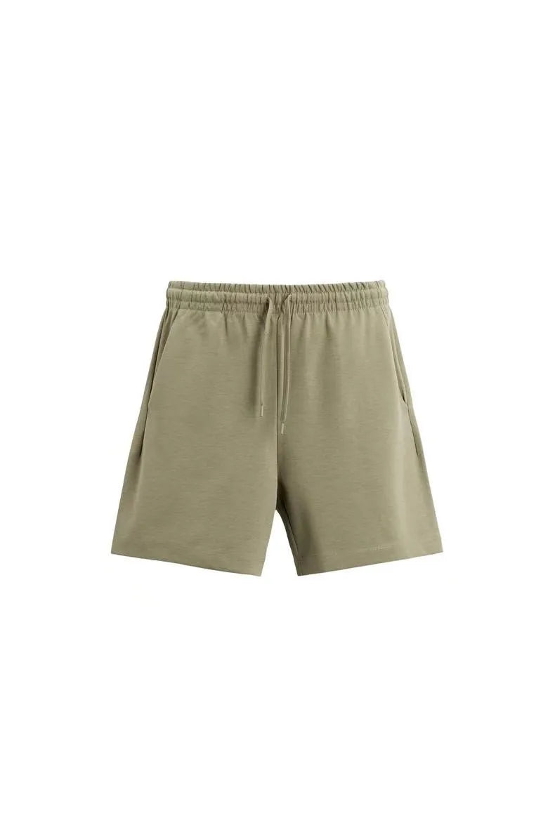 Loose double-sided cloth texture short sleeve shirt and matching shorts casual set on a hanger.