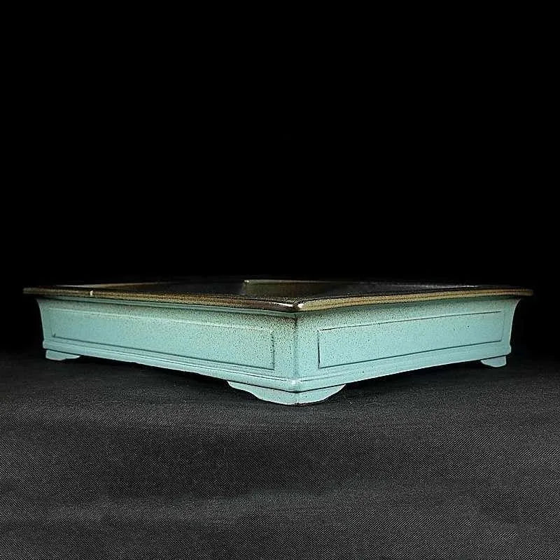 Green handmade ceramic bonsai pot with a retro crackle glaze finish.