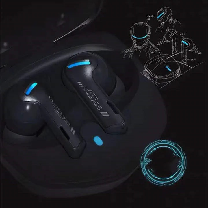 Grey QCY BH21G1A wireless Bluetooth gaming earbuds with their compact charging case on a table.