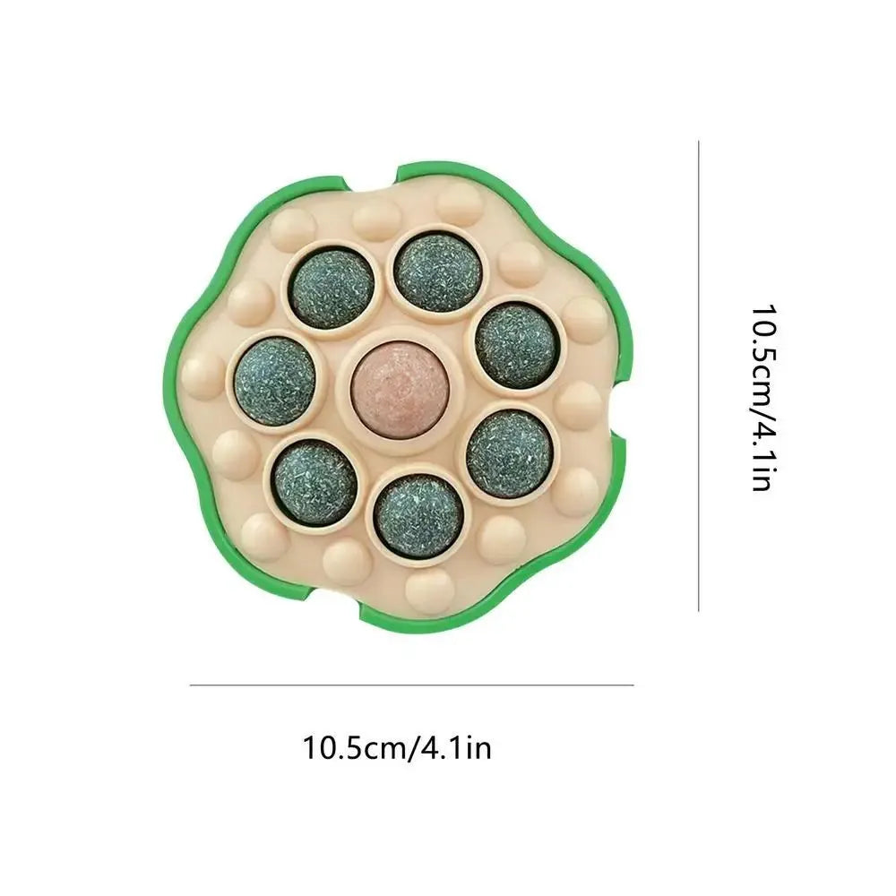 Four green lotus-shaped catnip balls mounted on wall for interactive feline play