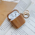 Bamboo AirPods cover with carbonised wood grain finish for generation 1 and 2 models