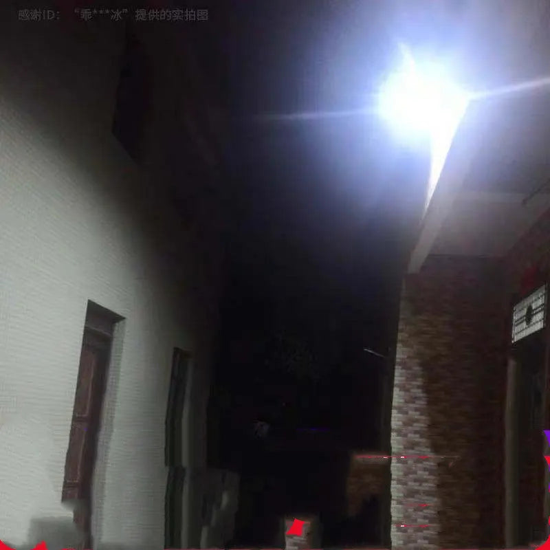 Black Cornucopia solar-powered LED flood light mounted on a wall bracket with remote control.