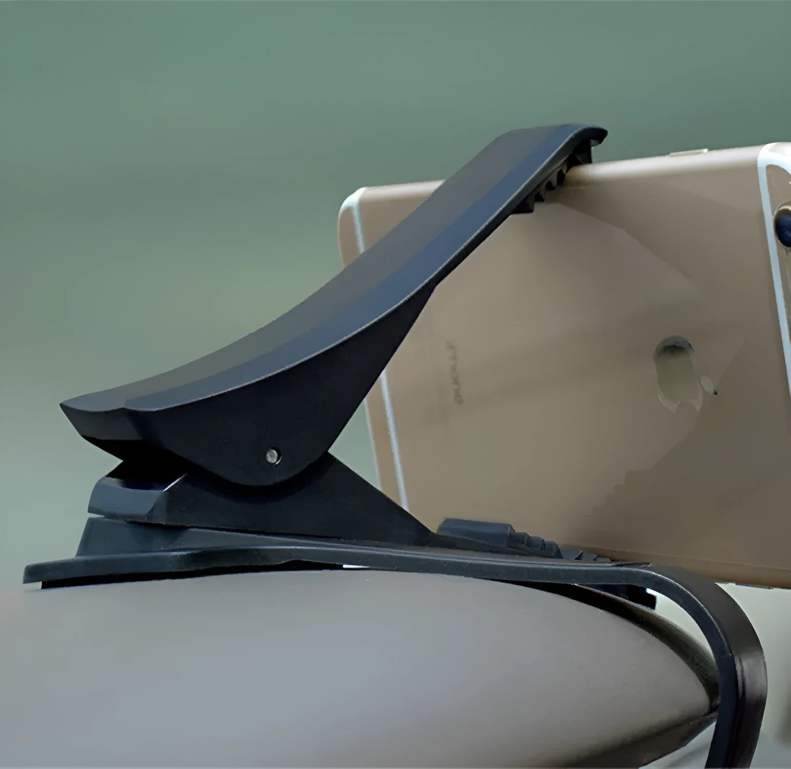 Rotary dashboard car phone holder in black with non-slip silicone clip for smartphones up to 6.5 inches