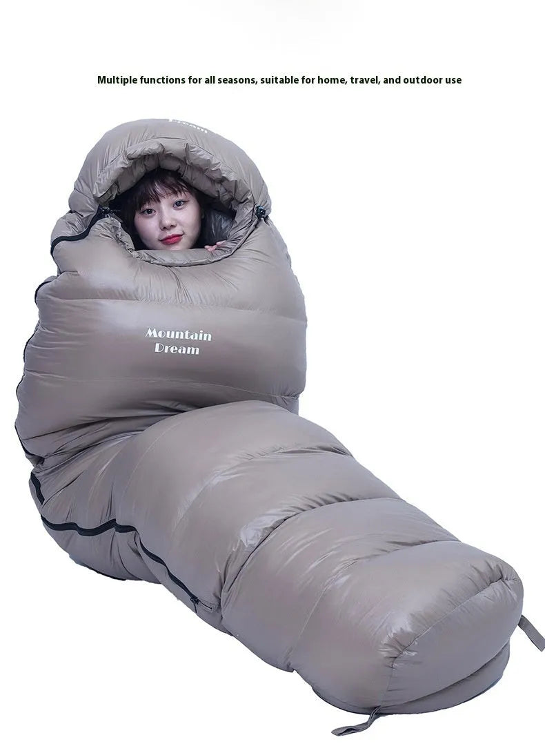 Ultralight mummy-style sleeping bag in army green colour with white duck down filling.