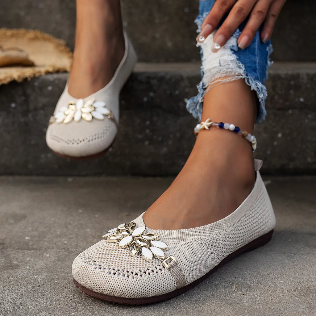 Women's round toe flat shoes with floral metal decoration, mesh upper, flat heel, available in beige, black, and blue