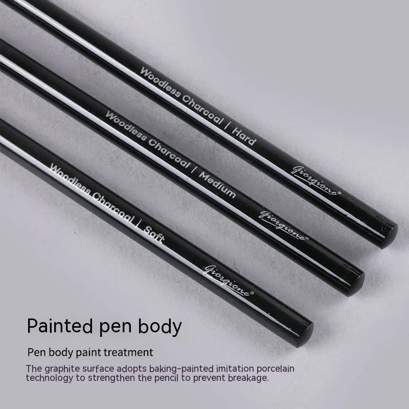 Set of nine wooden drawing pencils, six graphite and three carbonized, on a suction card.