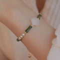 Chinese-style Hetian jade bracelet with antique bamboo joint design and 4mm shell pearl beads