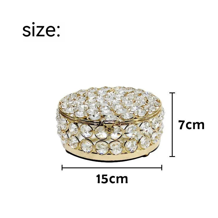 Clear crystal glass jewellery storage box with a French gold-coloured metal frame.