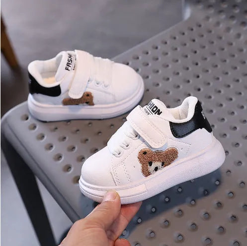Baby Bear cartoon pattern kids sports sneakers in black, green, and khaki on a white background.