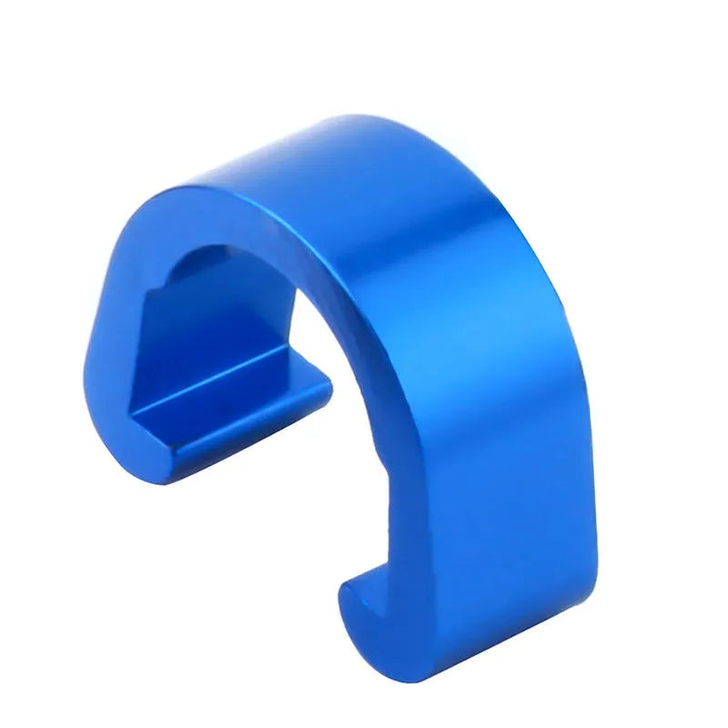 Ten small aluminium alloy C-shaped buckles in assorted colours on a white background.