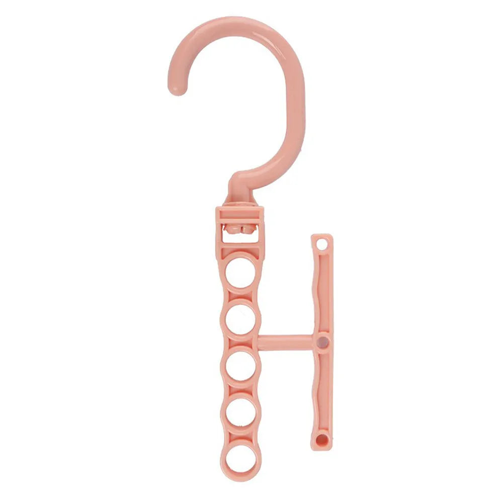Blue revolving plastic wardrobe hanger with five branches and a central handle.