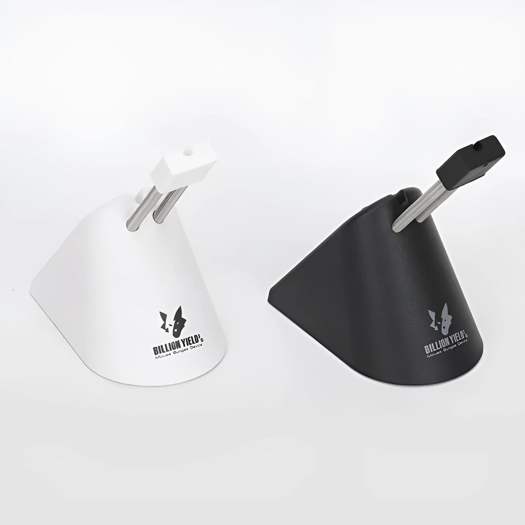 Black and white ABS plastic mouse cable holder for desktop wire management.