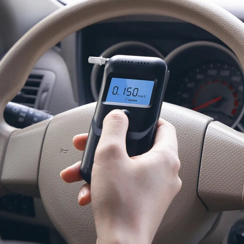 Black portable alcohol breath tester for household drunk driving detection