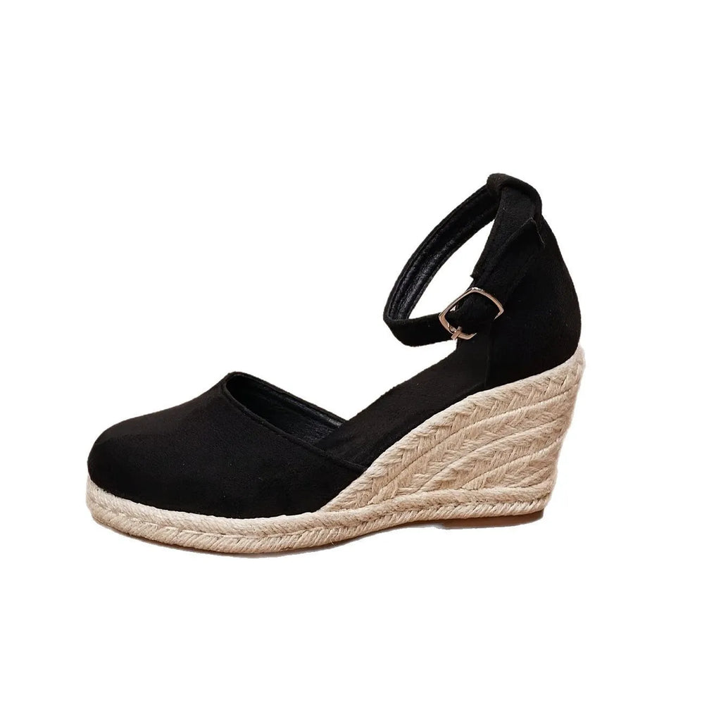 Women's apricot suede and canvas wedge sandals with a buckle strap.
