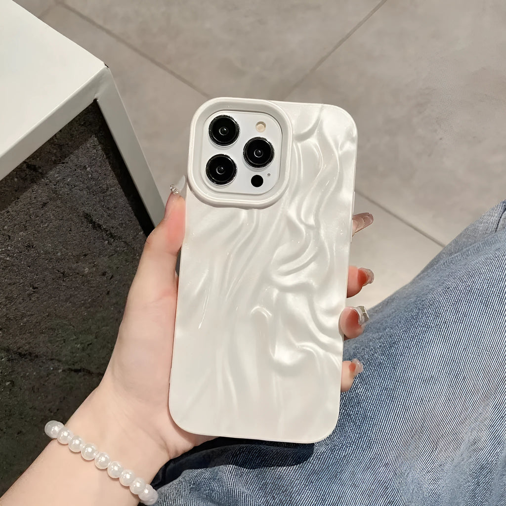 Solid colour water ripple texture silicone phone case for iPhone, shown in milky white, pink, and purple colour options.