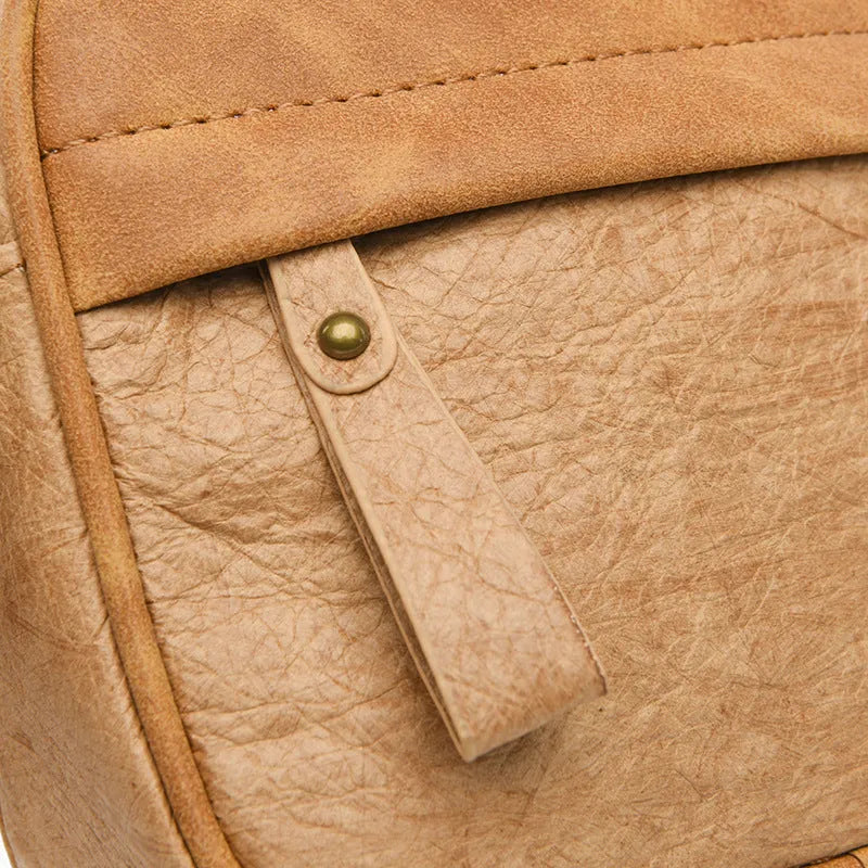 Men's waterproof paper crossbody bag in European retro style available in black, brown, and silver