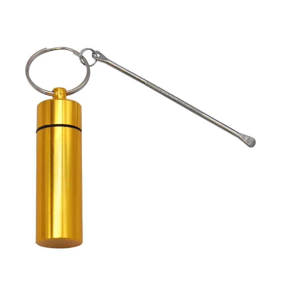 Aluminium pill storage bottle with built-in measuring spoon and keychain attachment in multiple colour options
