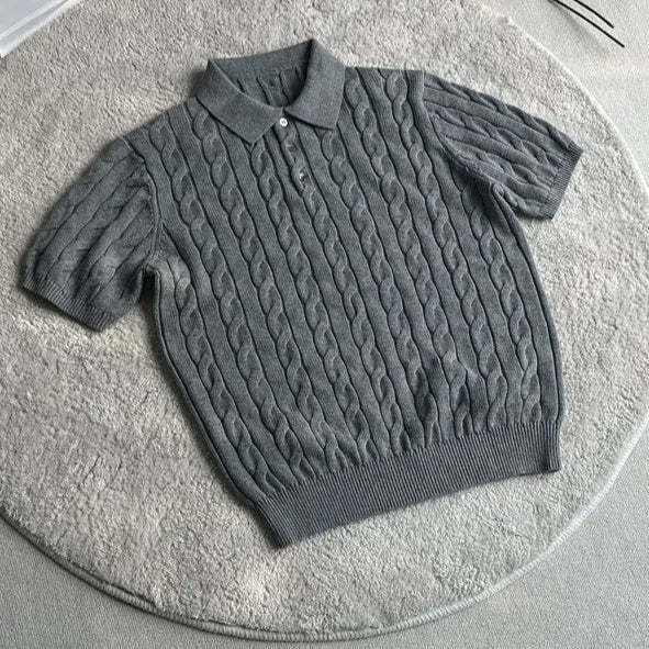 Men's twisted knit cotton short sleeve T-shirt in grey, shown on a hanger.