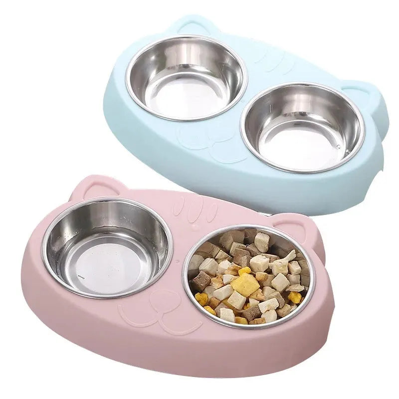 Blue plastic double-bowl pet food and water feeder tray with non-skid base.