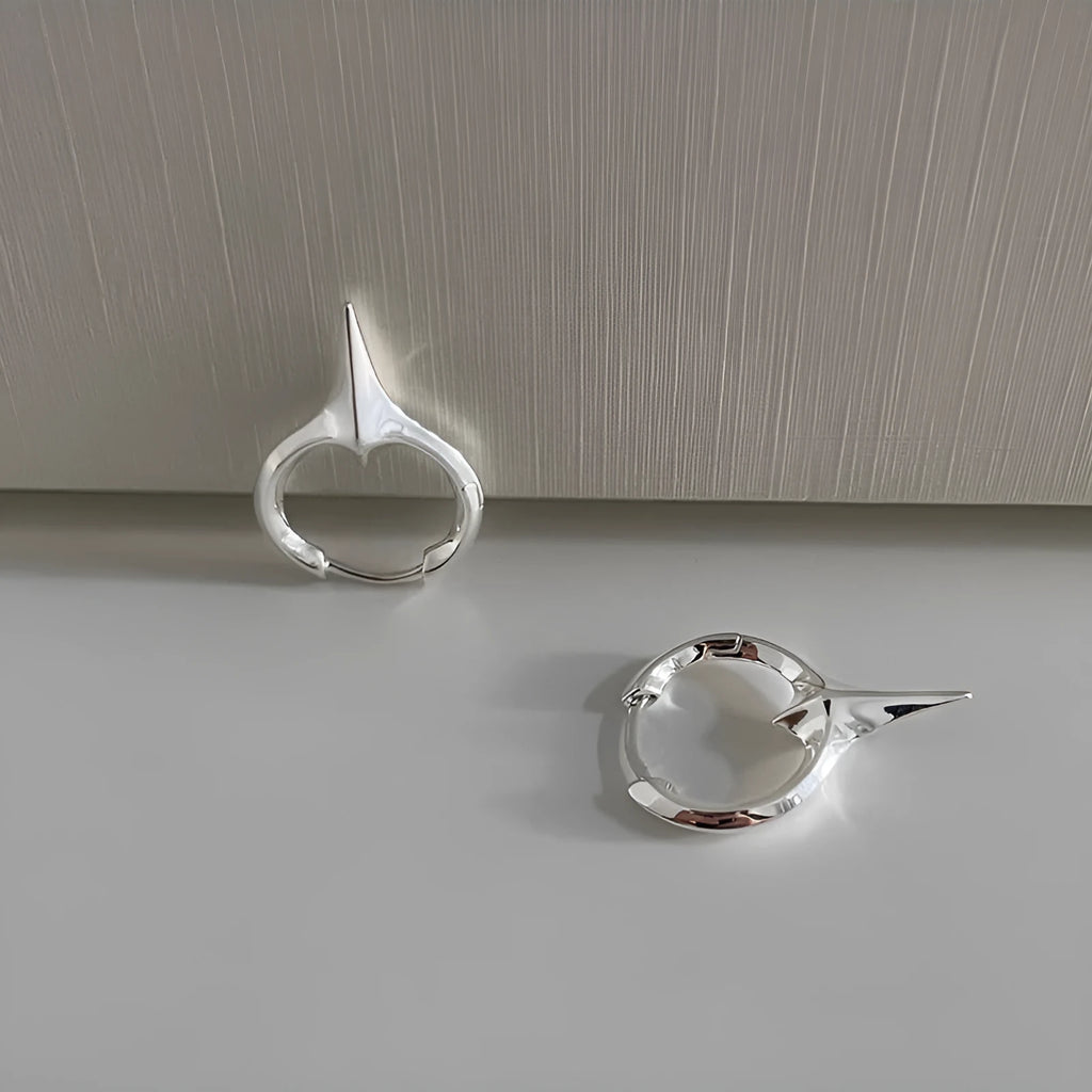 Geometric star-shaped ear clips for women with electroplated copper construction and metallic finish