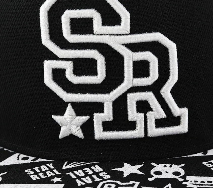 SR Black cotton baseball cap with front letter embroidery, showing adjustable snapback strap and dome crown.