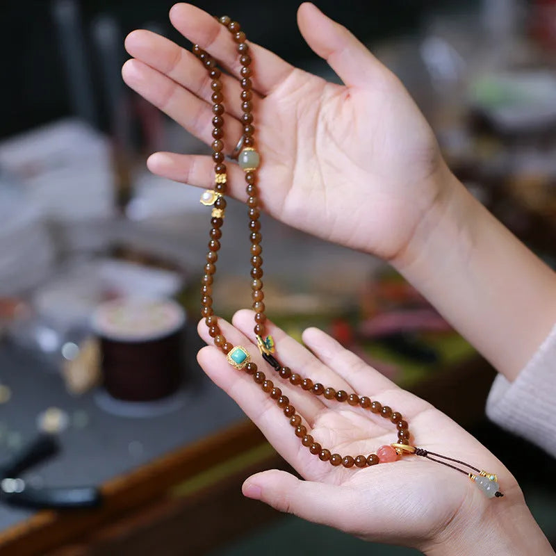 Brown jade Hetian jade three-ring bracelet with silver plated details for 14-16 cm wrists.