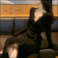 Black women's slim fit woolen skirt with a princess dress cut, made from polyester fabric.