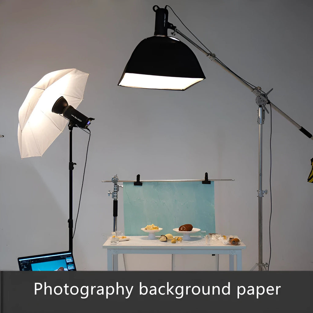 Double-sided marble and cement texture photography background paper laid flat.