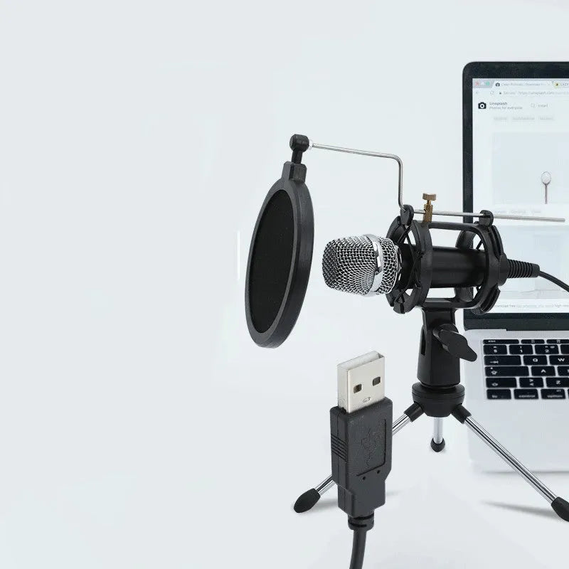 Black condenser microphone on stand with 3.5mm and USB cables for mobile and computer recording