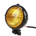 Black electroplated aluminium Harley retro headlight with 8cm glass lens for 12V electric vehicles.
