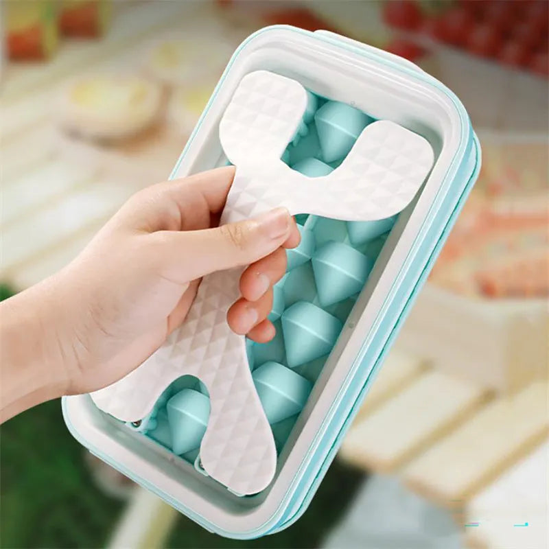 Light grey 2-in-1 silicone ice ball mould and water bottle with lid, showing portable design.