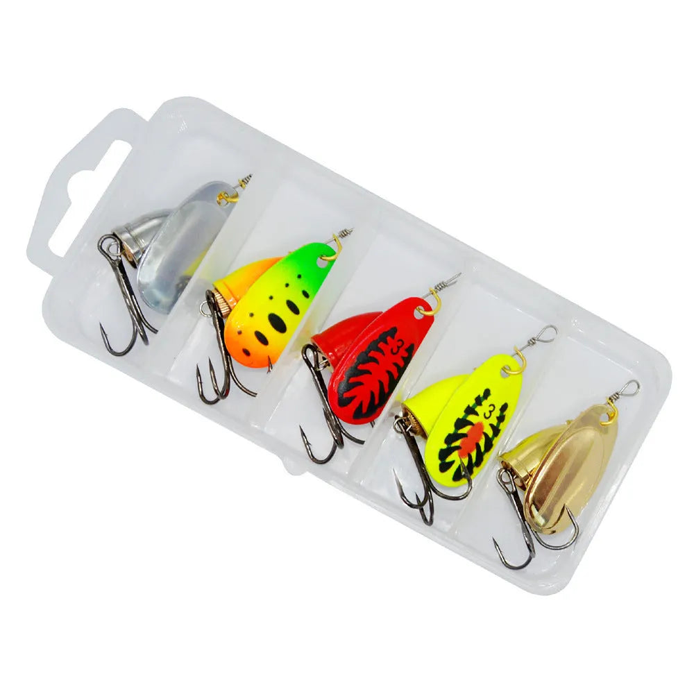 Metal fishing lure with rotating sequins and a copper bell in multiple colour variants including gold, red, and silver.
