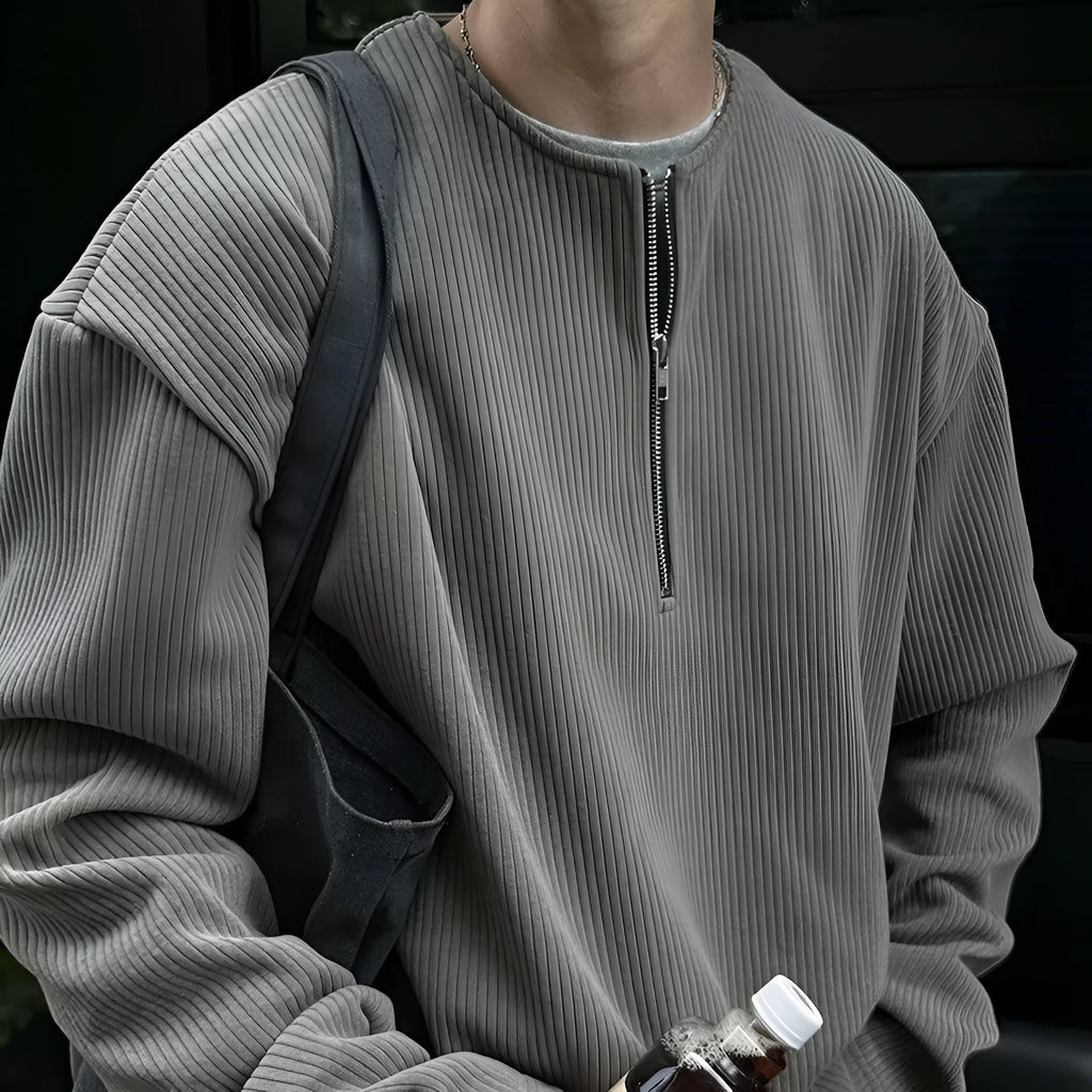 Solid colour loose fit long sleeve pullover top in grey, black, or apricot.