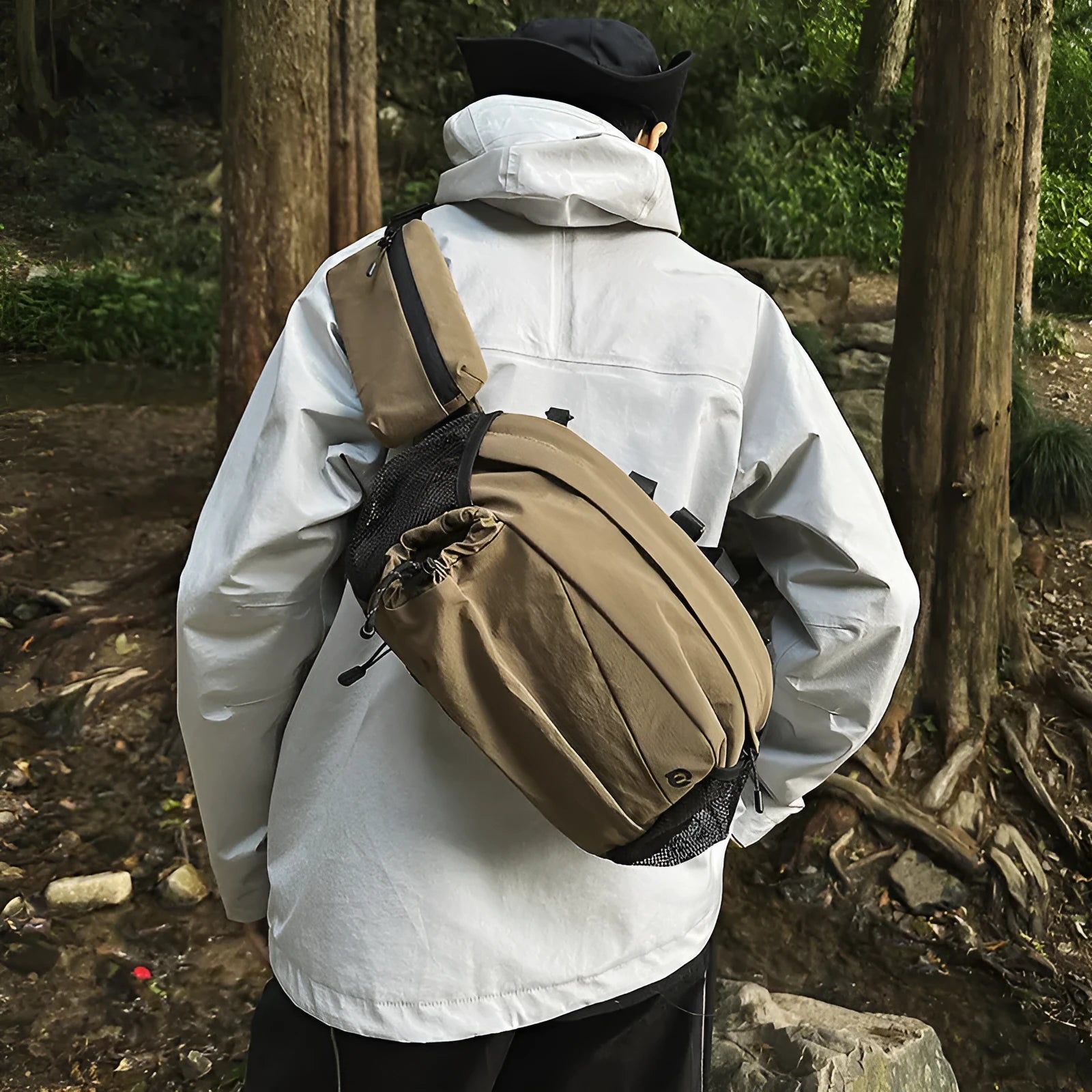 Unisex nylon waist backpack in Army Green colour with adjustable strap for outdoor travel.